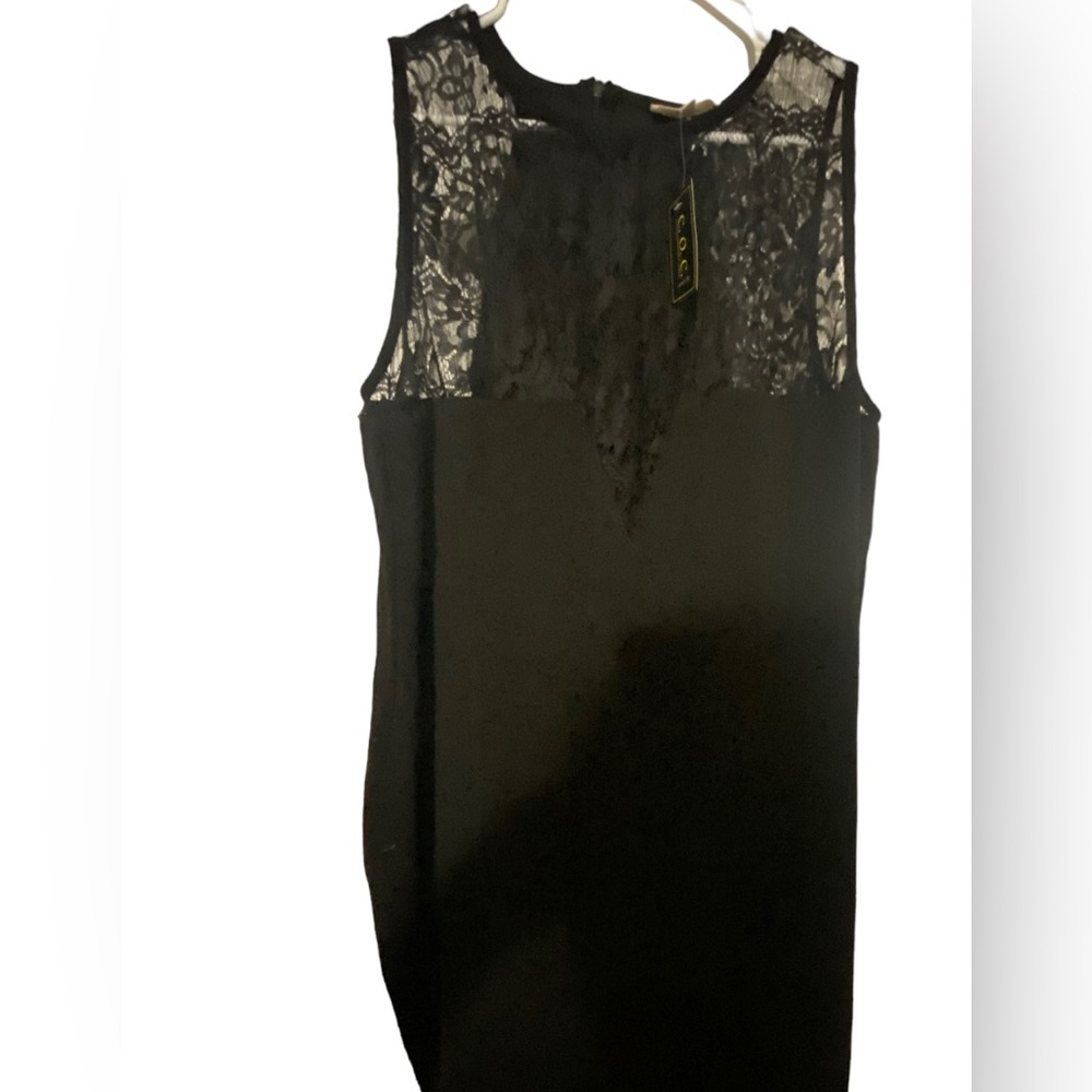 Women’s three XL black sheath dress with lace top new with tags.